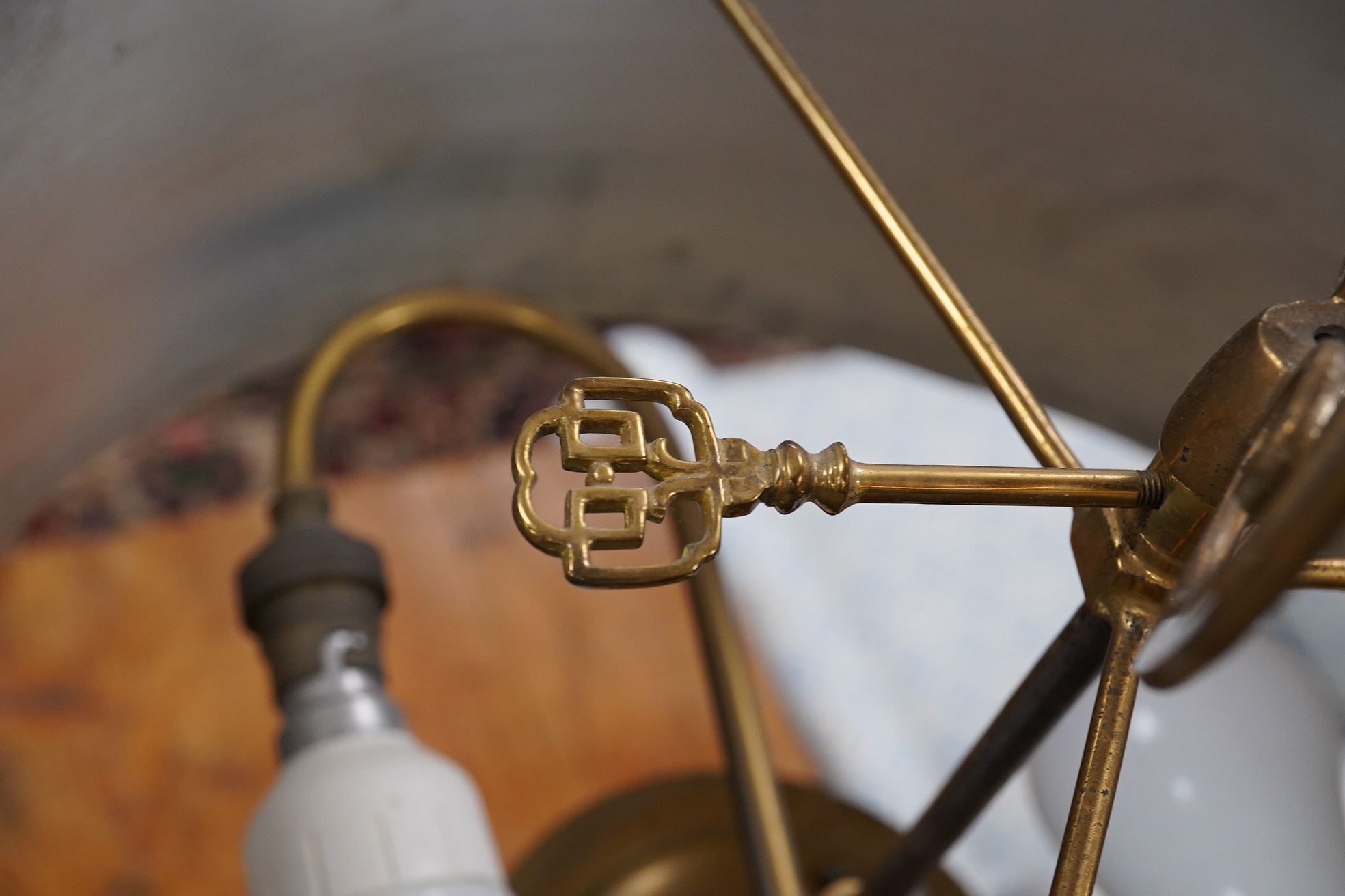 A 19th century style brass two light table lamp with metal shade, 83cm high. Condition - fair